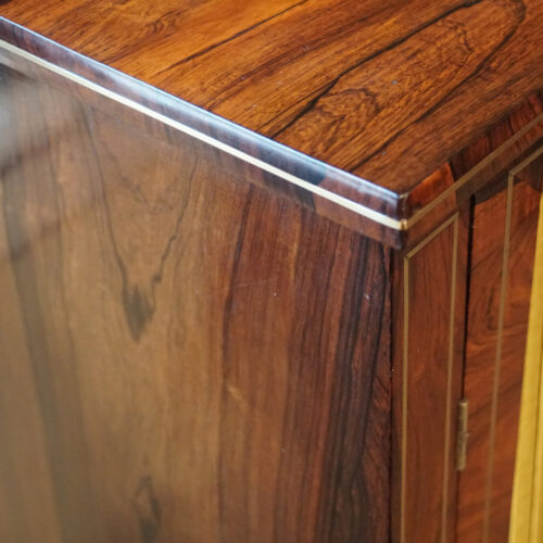 Regency brass inlaid side cabinet edge