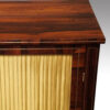 Regency brass inlaid side cabinet top corner