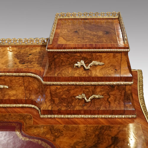 Victorian walnut inlaid writing table stationary drawers