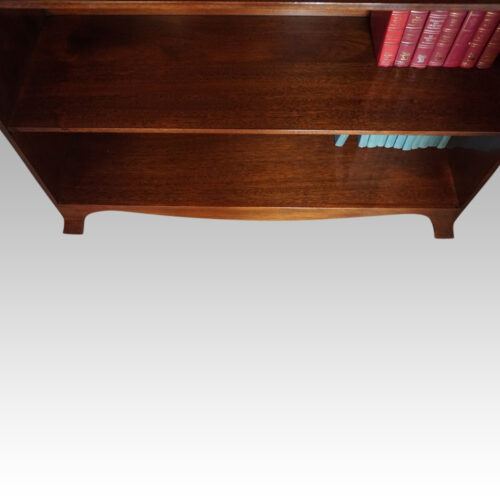 George V mahogany waterfall open bookcase bottom shelf