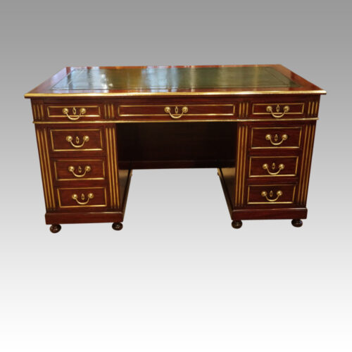 Antique brass mounted mahogany desk