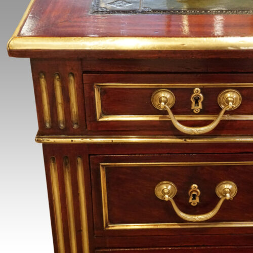 Antique brass mounted mahogany desk drawer detail