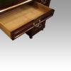 Antique brass mounted mahogany desk drawer open