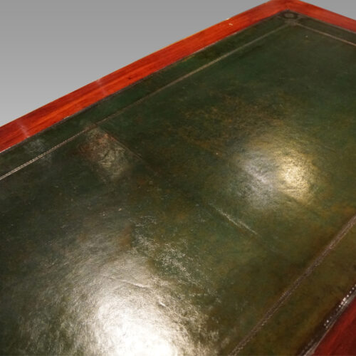 Antique brass mounted mahogany desk leather