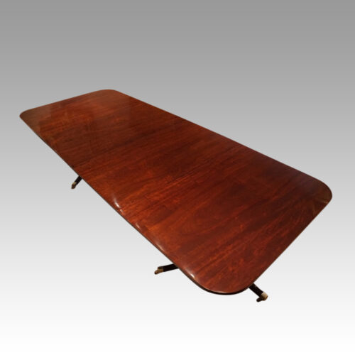 Antique mahogany twin pillar dining table
