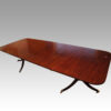 Antique mahogany twin pillar dining table side