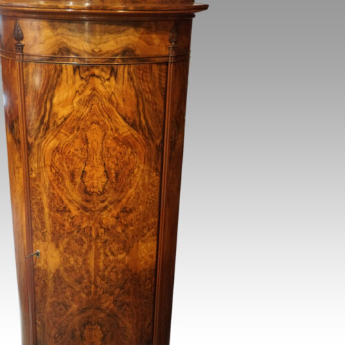 Antique walnut cylinder cabinet door detail