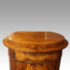 Antique walnut cylinder cabinet top detail