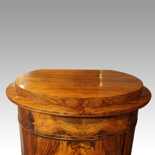 Antique walnut cylinder cabinet top detail