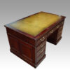 Edwardian mahogany pedestal desk angle