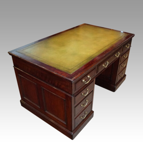 Edwardian mahogany pedestal desk angle