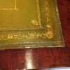 Edwardian mahogany pedestal desk corner detail