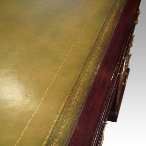 Edwardian mahogany pedestal desk leather edge