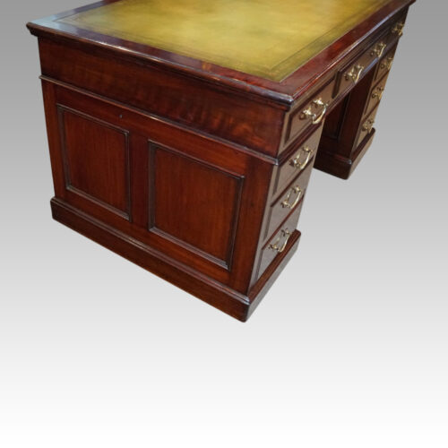 Edwardian mahogany pedestal desk side angle