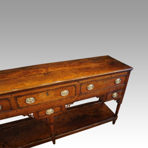 George III oak pot board dresser base angle view