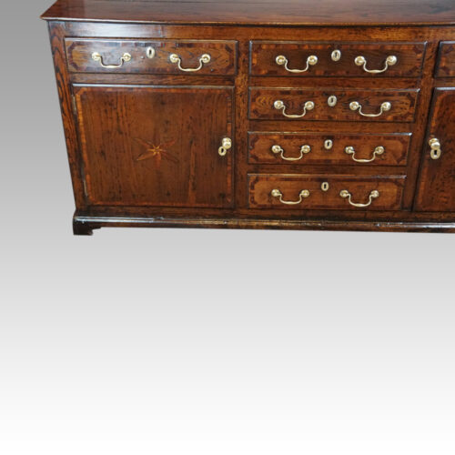 Georgian oak inlaid dresser base front detail