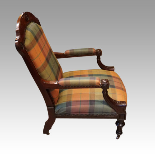 Pair of Victorian mahogany easy armchairs side view