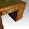 Victorian oak pedestal desk at angle