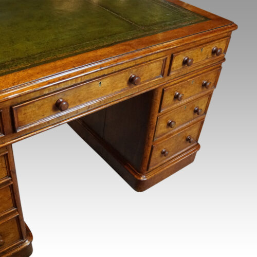 Victorian oak pedestal desk at angle