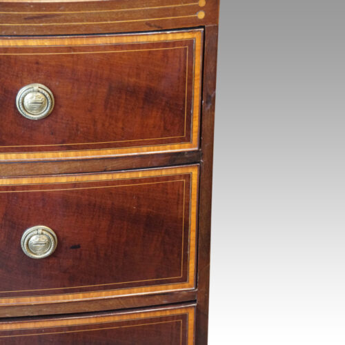 George III inlaid bow front chest edge