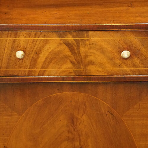 George V mahogany waterfall bookcase drawer