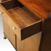 George V mahogany waterfall bookcase drawer open