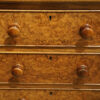 Pair of Victorian walnut bedside chests drawer fronts