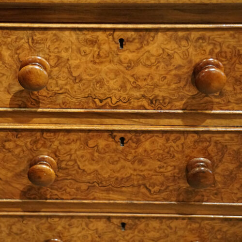 Pair of Victorian walnut bedside chests drawer fronts