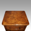 Pair of Victorian walnut bedside chests top