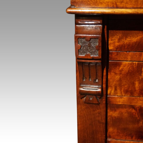 Victorian mahogany Wellington chest carving detail