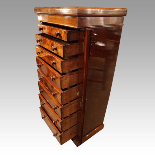 Victorian mahogany Wellington chest drawers open
