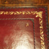 Victorian walnut inlaid Davenport leather detail