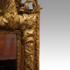 19thc. gilt arch top mirror shoulder detail