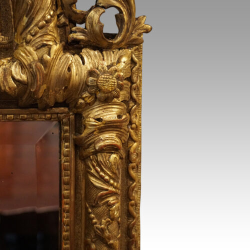 19thc. gilt arch top mirror shoulder detail