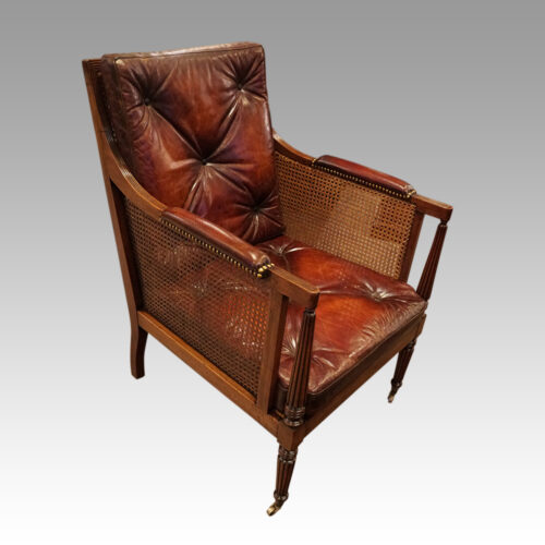 19thc. mahogany library chair at angle