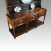 Antique oak dresser at angle