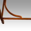 Edwardian inlaid mahogany cylinder desk stretchers