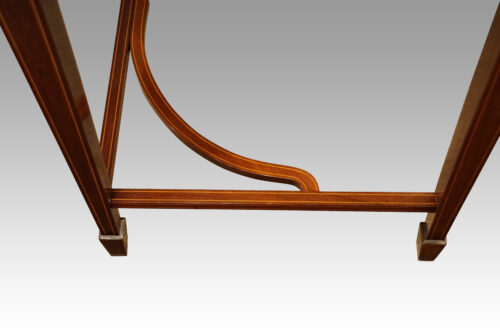 Edwardian inlaid mahogany cylinder desk stretchers