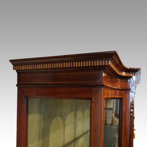 Edwardian inlaid mahogany display cabinet cornice detail