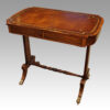 Regency rosewood writing table at angle