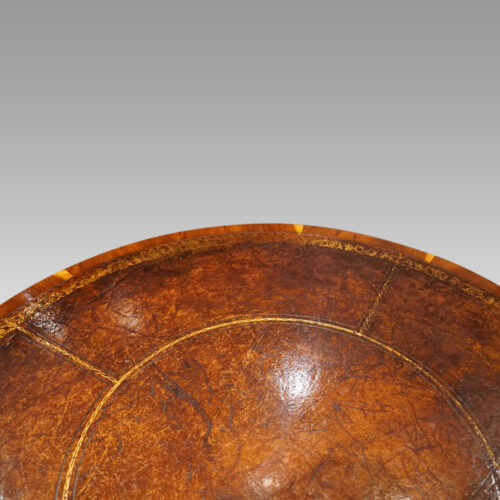 Regency style drum table leather detail