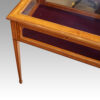 Edwardian satinwood curio table corner