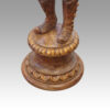 Large pair of blackamoor Walnut candelabra base