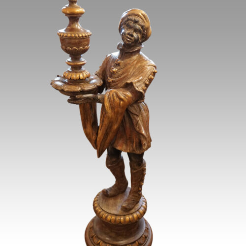 Large pair of blackamoor Walnut candelabra body
