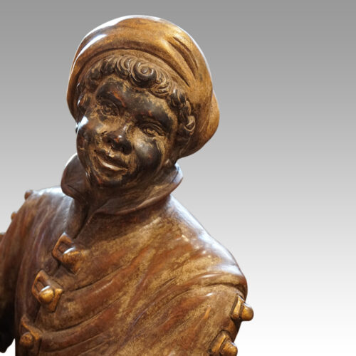 Large pair of blackamoor Walnut candelabra face detail