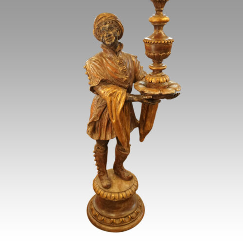 Large pair of blackamoor Walnut candelabra figure