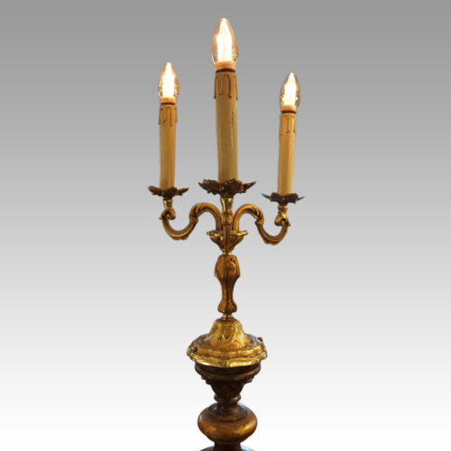 Large pair of blackamoor Walnut candelabra gilt light