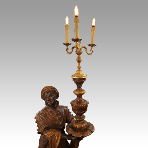 Large pair of blackamoor Walnut candelabra lights