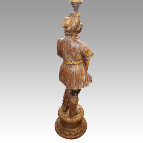 Large pair of blackamoor Walnut candelabra rear