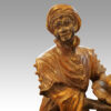 Large pair of blackamoor Walnut candelabra torso